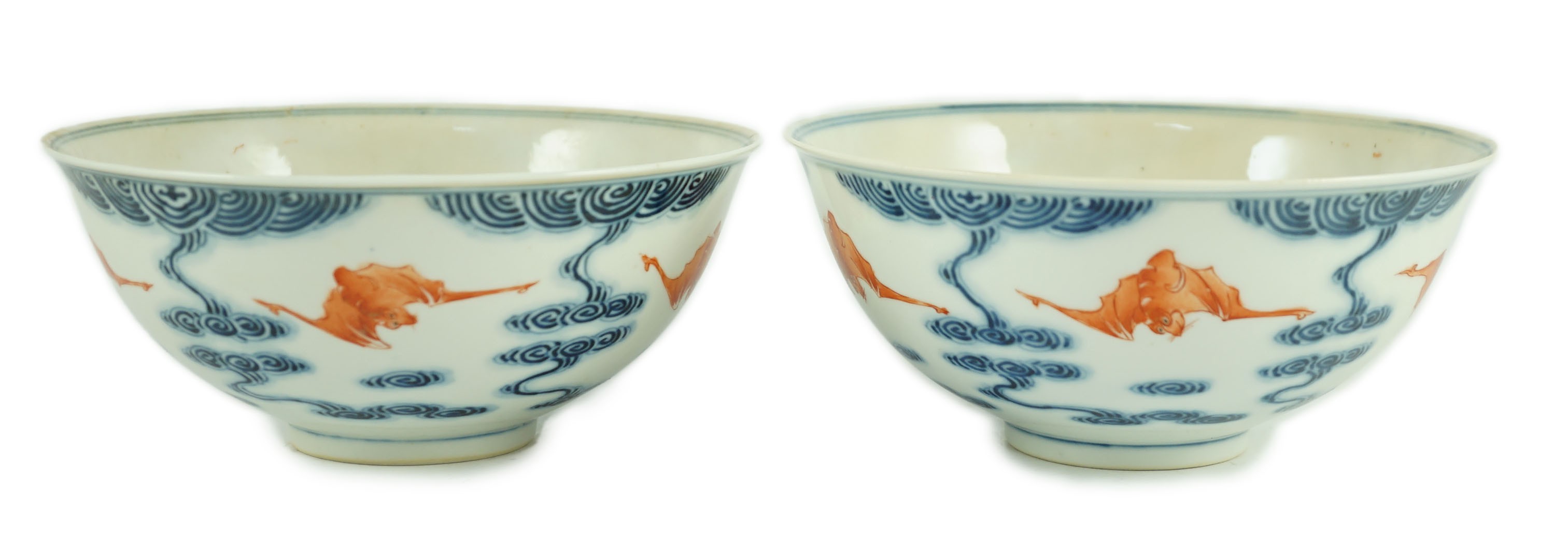 A pair of Chinese iron red and underglaze blue ‘five bat’ bowls, Guangxu mark and probably of the period (1875-1908), 16.5cm diameter